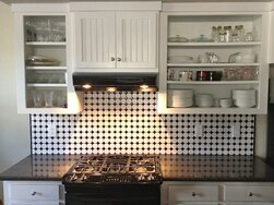 Picture of white kitchen cabinet design. You can Matching colors in the kitchen cabinets and counter.